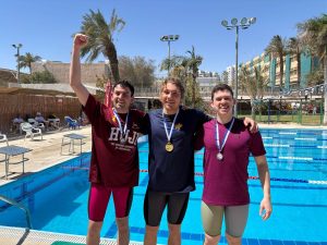 נבחרת השחייה עם מדליות מאליפות אס"א 2025